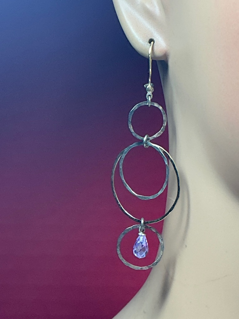 Sterling Silver Multi Circles Dangle Earrings with a purple stone. 3” long